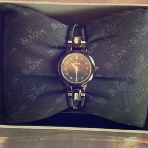 Bulova women’s black bracelet watch